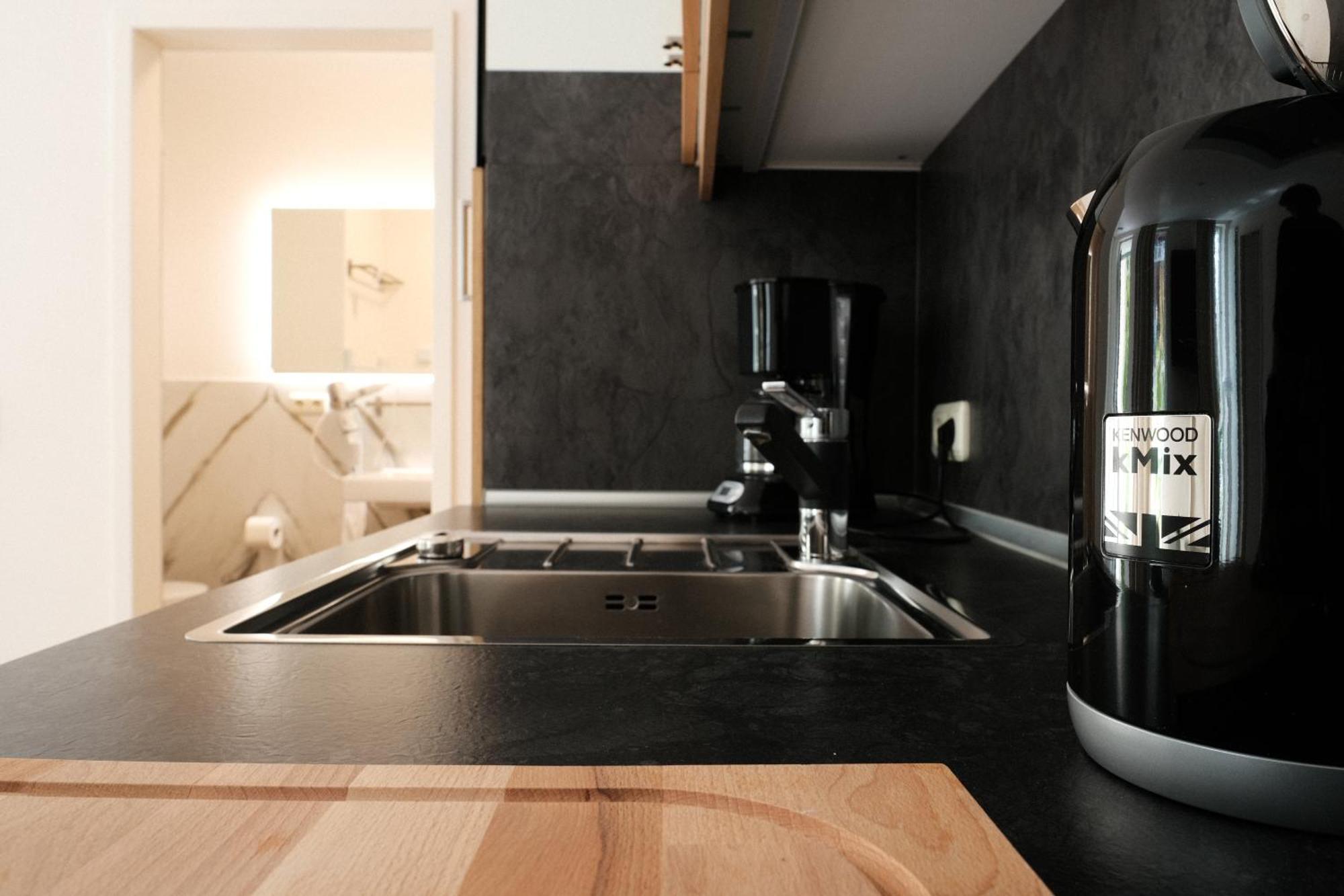 Apartments Zur Alten Konditorei Шверин Номер фото